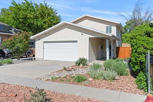 View of front of home featuring a garage