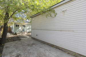 View of property exterior featuring a patio