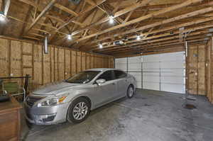 Garage featuring a garage door opener