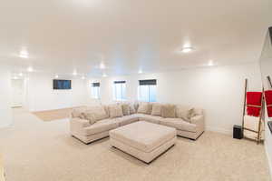 Living room with light colored carpet