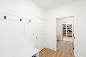 Mudroom featuring light hardwood / wood-style floors