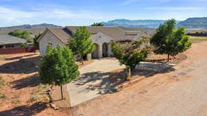 View of front of home featuring a mountain view