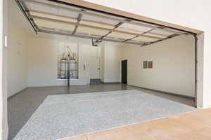 Garage with a garage door opener epoxy floors