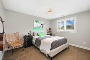 View of carpeted bedroom