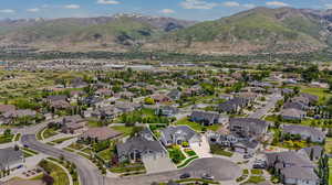 Birds eye view of property with a mountain view