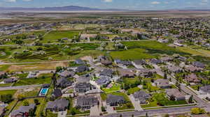 Birds eye view of property with a mountain view