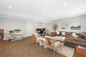 Living room featuring carpet flooring