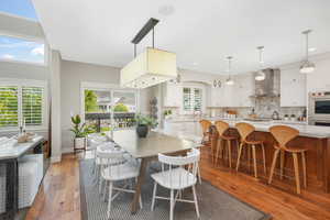 Dining room with hardwood / wood-style floors