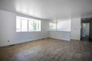 Empty room featuring tile flooring