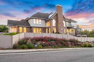 View of front of home featuring a balcony