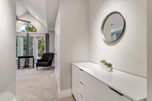 Bathroom with lofted ceiling