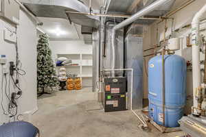 Utility room with gas water heater