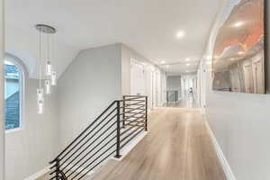 Hall featuring light hardwood / wood-style floors