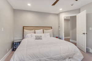 Bedroom with carpet floors and ceiling fan