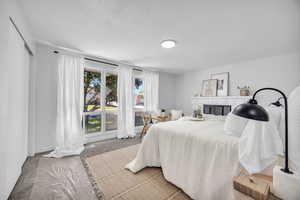 Primary Bedroom 3 featuring large windows.