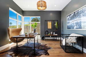 Main floor office with Oak Wood doors and 90* walled windows