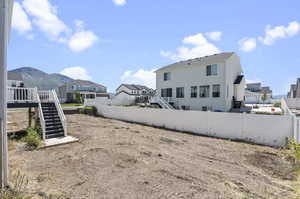 Rear view of house with a mountain view