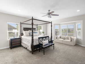 Bedroom with carpet and ceiling fan