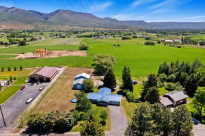 Aerial view featuring a mountain view and a rural view