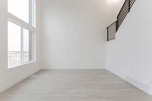 Empty room featuring light hardwood / wood-style floors