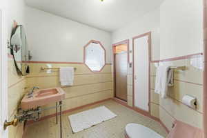 Primary Bathroom featuring original art deco tile.