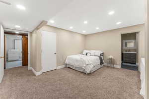 spacious  bedroom with en suite bathroom.