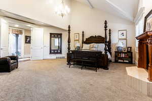 Carpeted bedroom featuring high vaulted ceiling, multiple windows, an inviting chandelier, and beamed ceiling