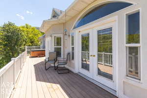 Trex deck featuring french doors from Primary bedroom and Kitchen