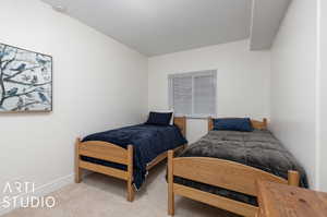 Bedroom featuring carpet flooring