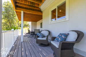 Wooden deck with outdoor lounge area