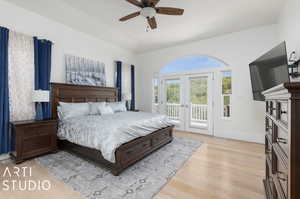 Bedroom featuring ceiling fan, access to exterior, light hardwood / wood-style flooring, and french doors