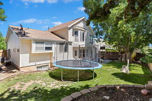 Large backyard with trampoline and swing set that can be included.