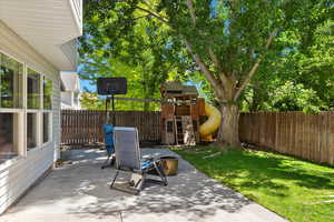 Back patio with mature trees.