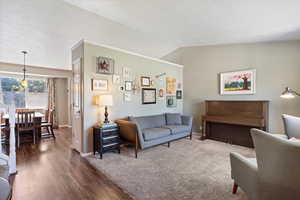 Beautiful living room with large window to invite plenty of natural light.