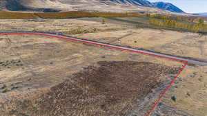 Birds eye view of property featuring a rural view and a mountain view