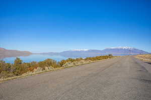 View of street with a water and mountain view