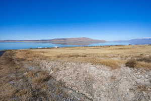 Mountain view featuring a water view