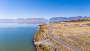 Bird's eye view with a water and mountain view