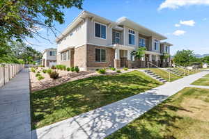 View of front of home featuring a front lawn