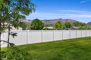 View of yard with a mountain view