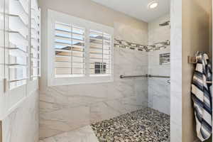 Bathroom with a tile shower