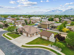 Birds eye view of property with a mountain view