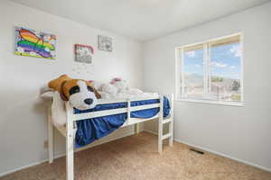 View of carpeted bedroom