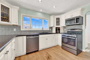 Updated Kitchen with Stainless Steel appliances and brand new dishwasher.