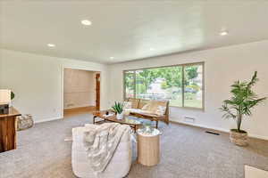 Living room with carpet floors