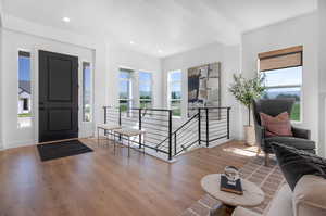 Entryway featuring hardwood / wood-style flooring and plenty of natural light