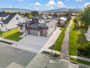 Exterior space with a mountain view and a front yard