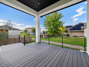 Wooden terrace with a yard