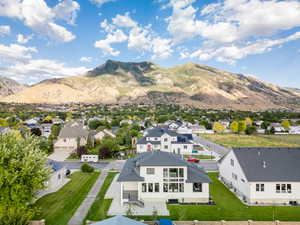 Birds eye view of property with a mountain view