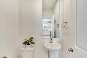 Bathroom with sink and toilet